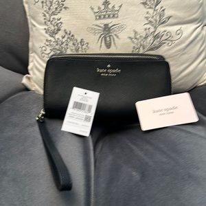 Black Kate Spade Staci saffiano leather wristlet with strap